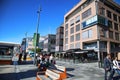 OSLO, NORWAY Ã¢â¬â AUGUST 17, 2016: People walking on modern district on street Stranden, Aker Brygge district with lux Royalty Free Stock Photo